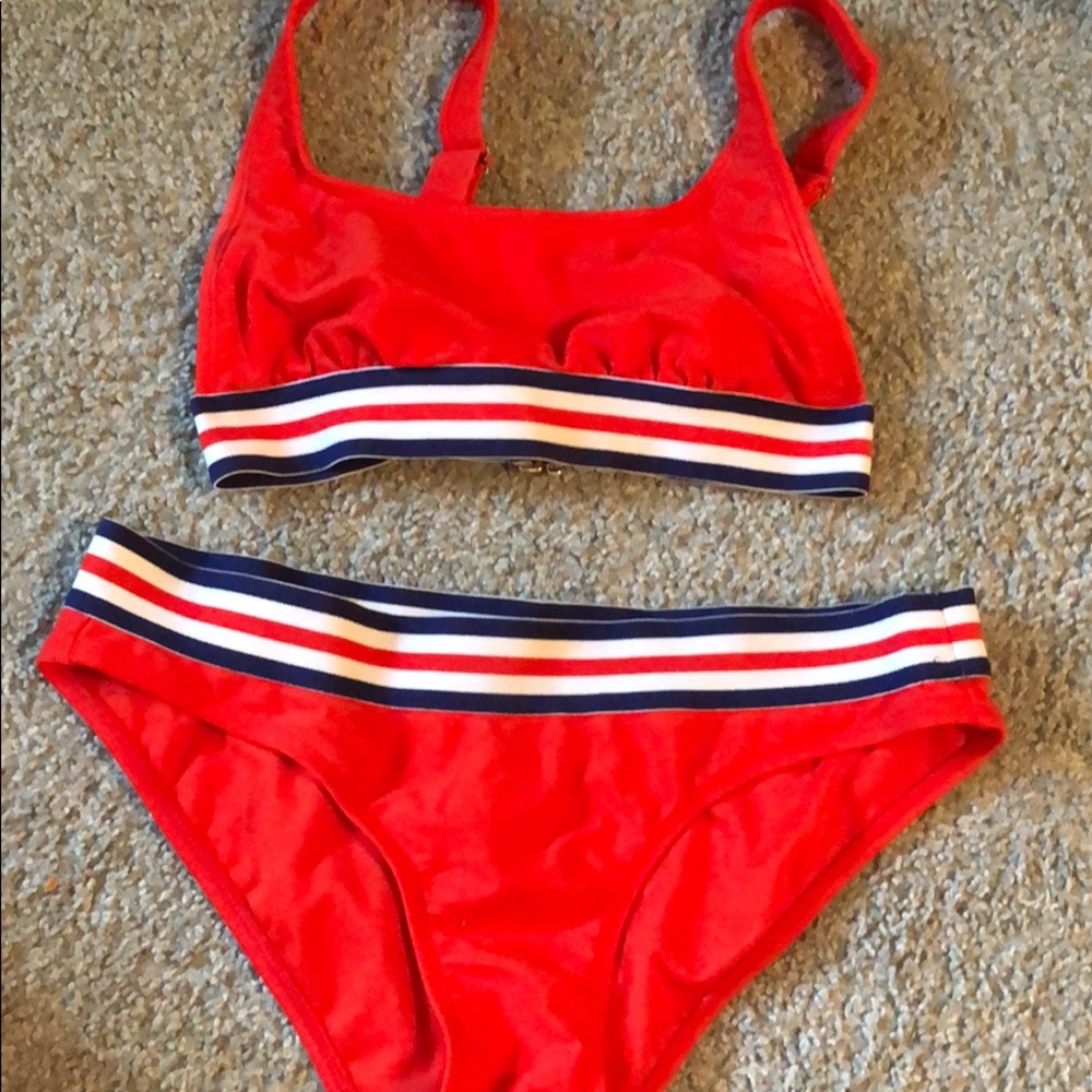 orange bathing suit with striped band!